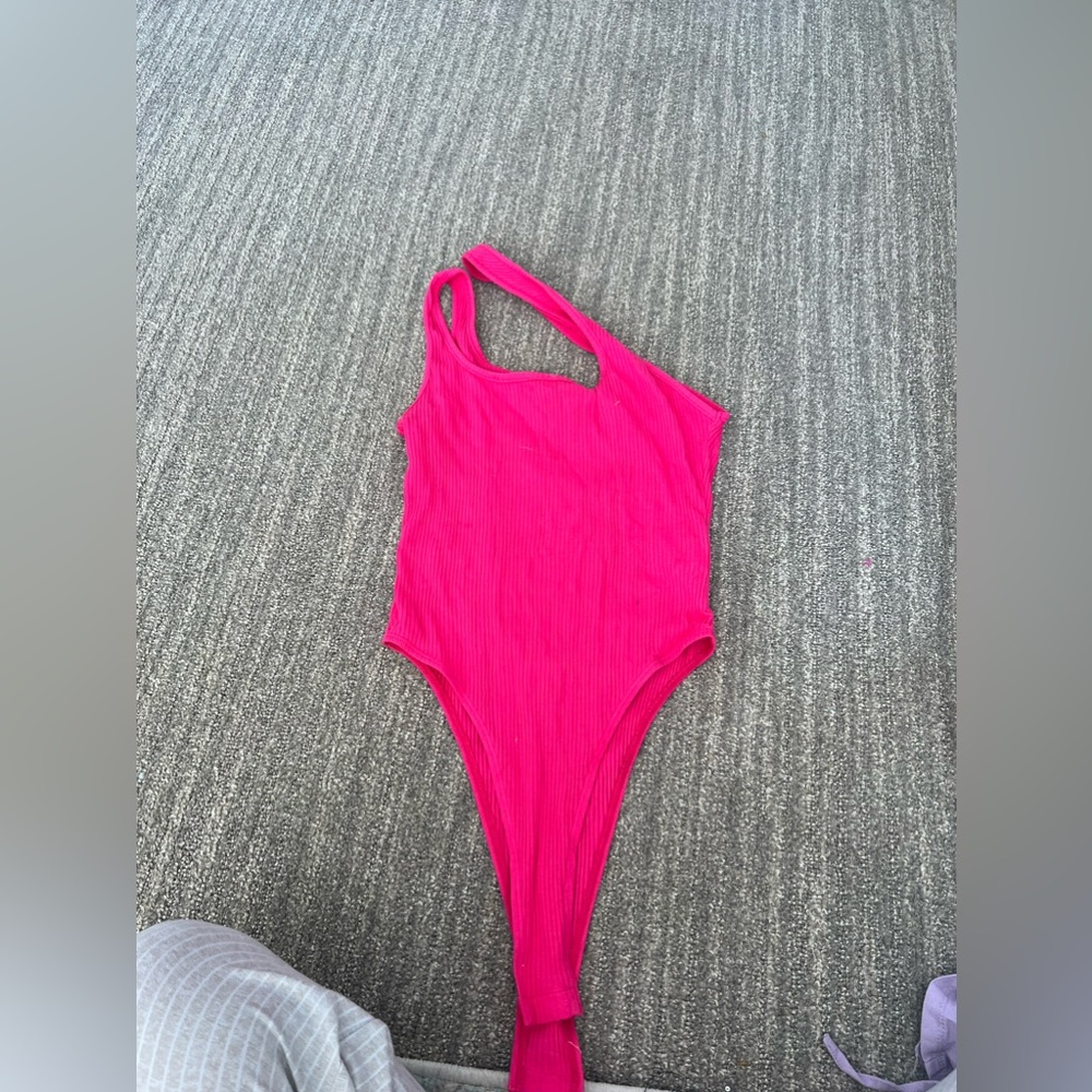 Asymmetrical body suit